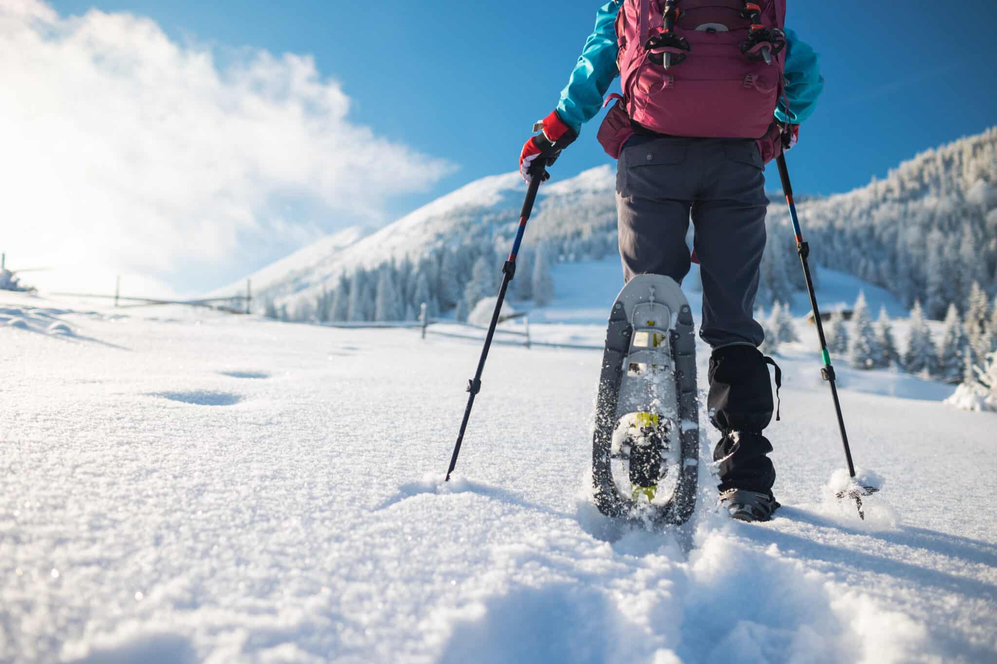 person snowshoeing